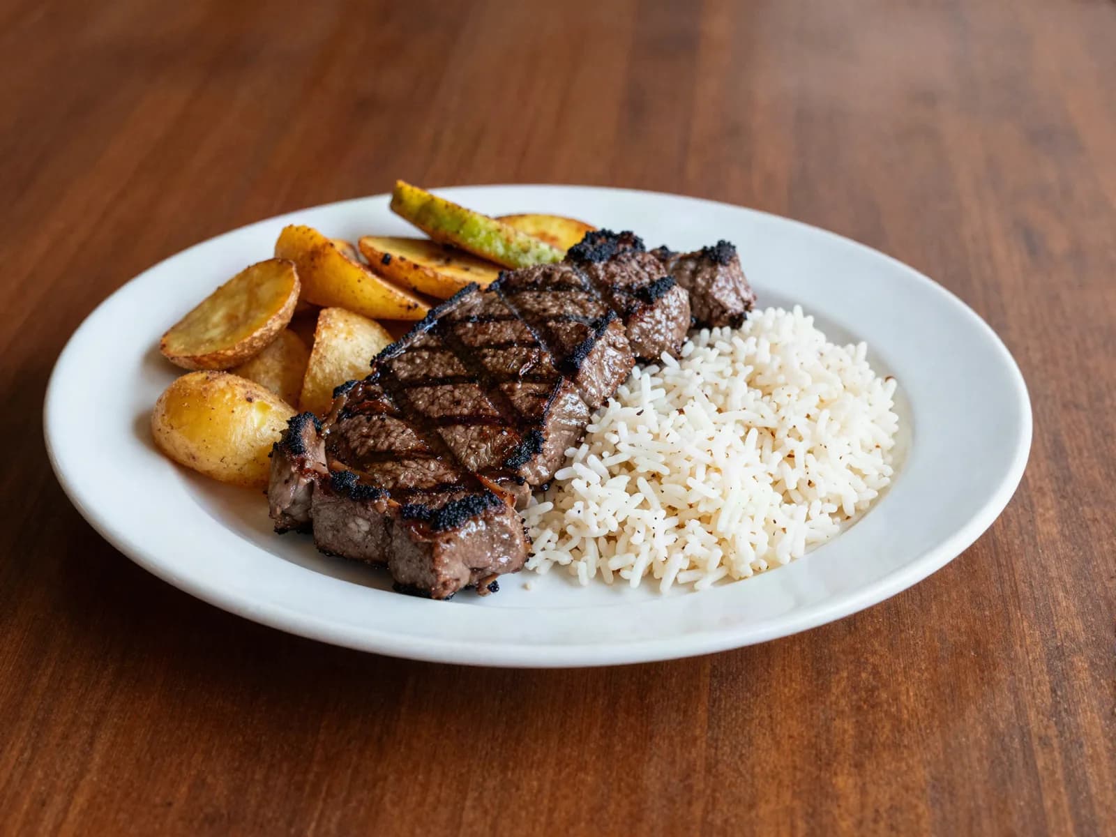 Imagen de referencia de Churrasco: + tres guarniciones